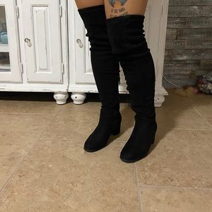 Black thigh high lace up boots with block heel